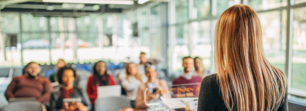 A woman giving a presentation